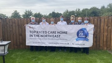 Staff and Residents at Highfield celebrate together after being rated as a Top 20 care home